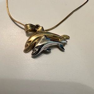 Dolphin pendant necklace.